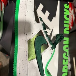 Nike White and Green Sneakers with Orange Accent